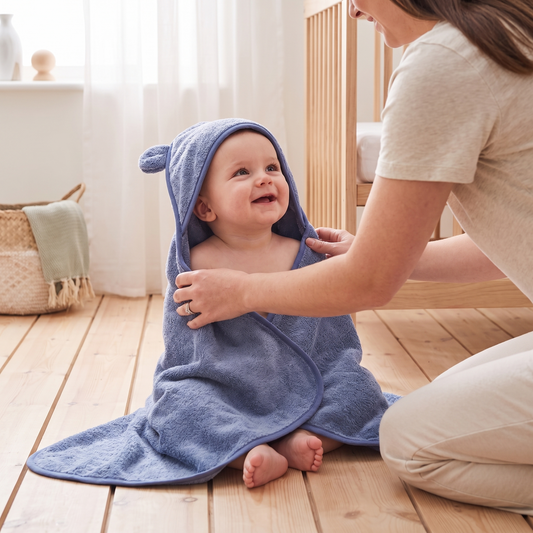 Little Teekie Personalised Small Hooded Towel | Embroidered Name, Super Soft Cotton – Wave Blue – in use, shows scale