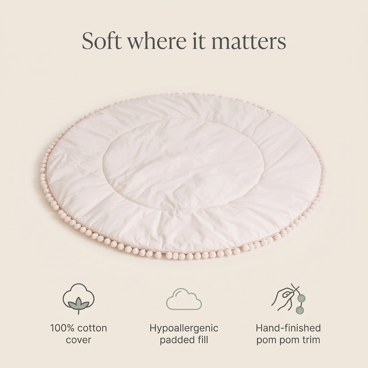 Play mat features: cotton cover, hypoallergenic fill, pom pom trim
