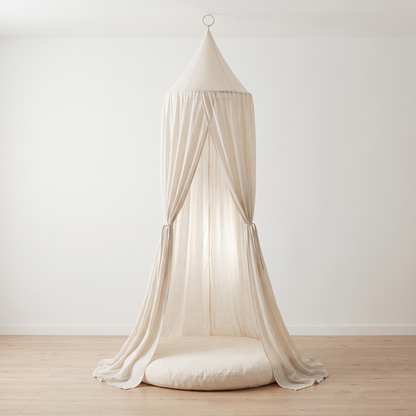 Oatmeal sheer linen-look kids bed canopy hanging in a bright bedroom