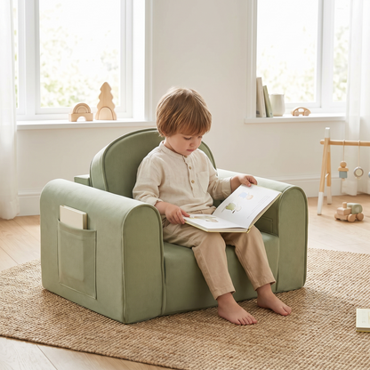 Child reading a book in the sage kids foam chair