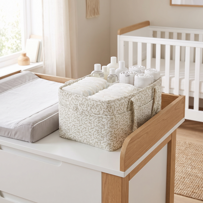 Nappy caddy stocked with nappies and essentials on a change table