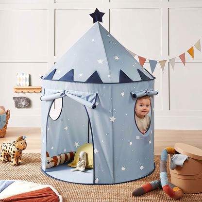 Toddler peeking through the peek-a-boo window of the starry play tent