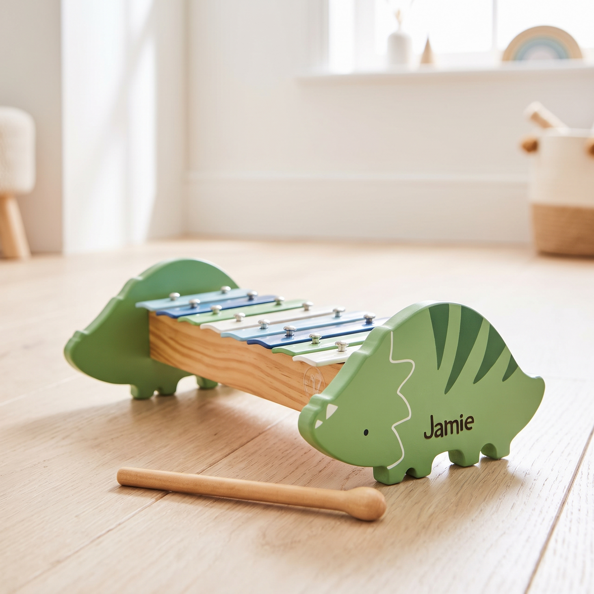 Personalised green and blue wooden dinosaur xylophone with engraved name and beater