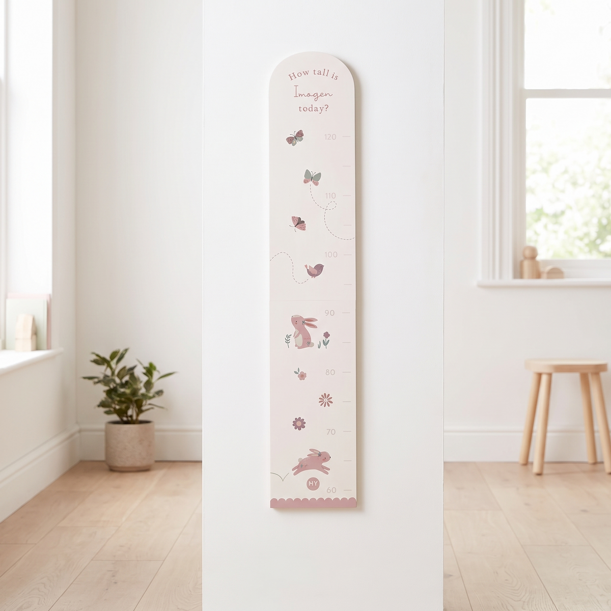 Personalised woodland wooden height chart in green and pink tones with printed name