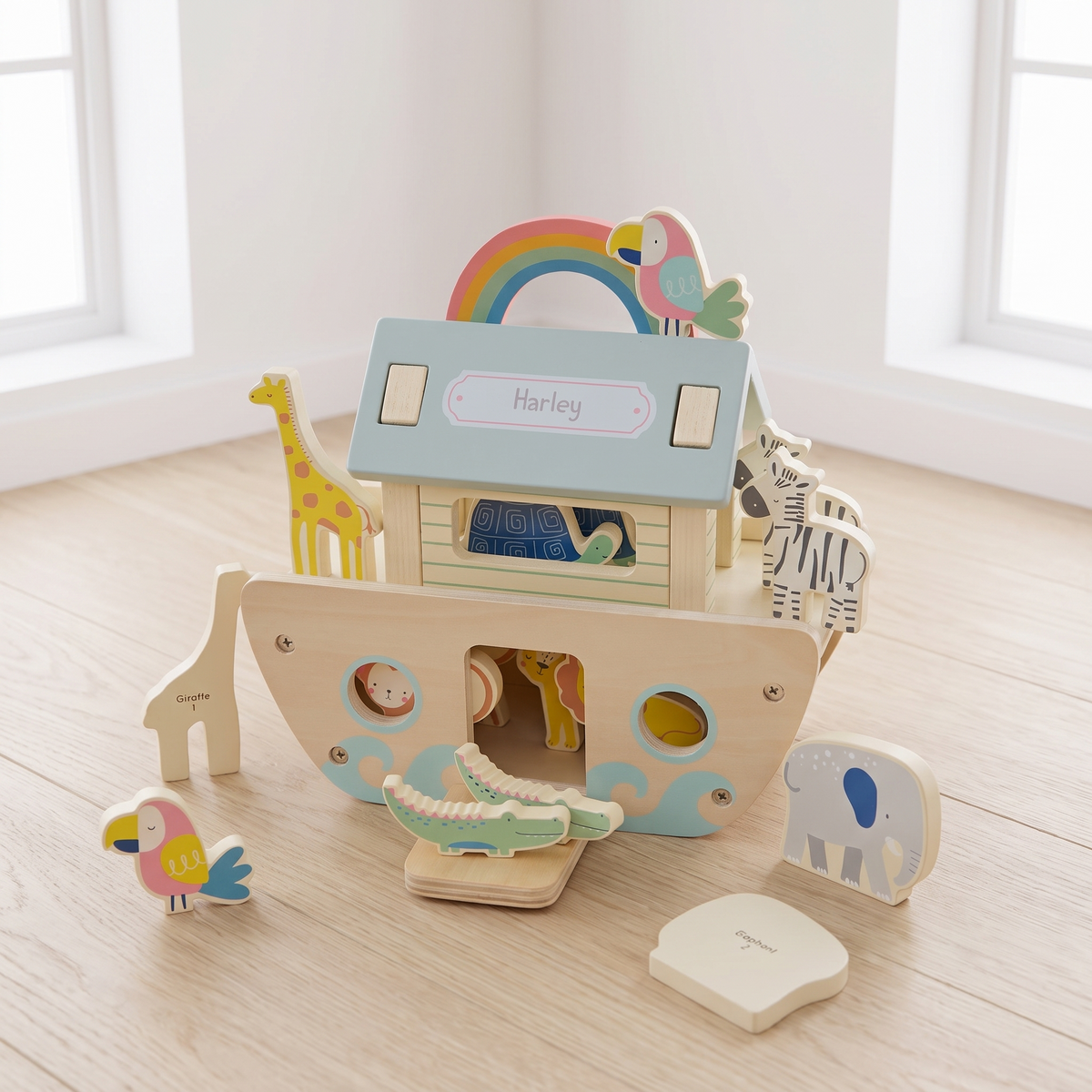 Personalised wooden Noah's ark play set with animal pairs on a natural background