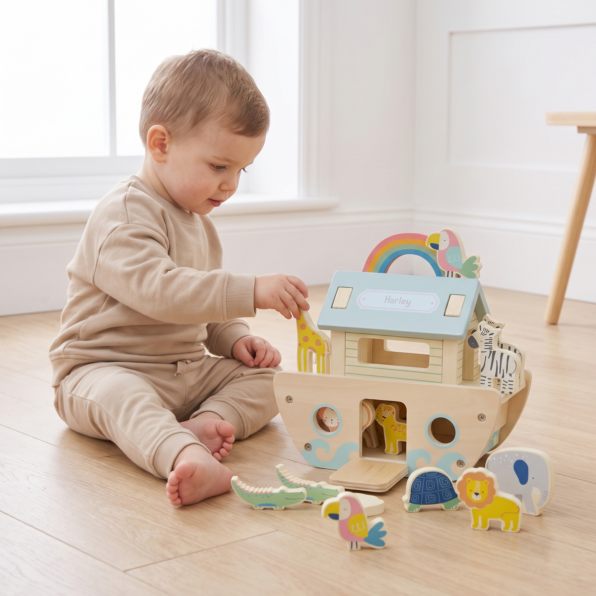 Wooden Noah's ark toy with animals two by two styled in a kids playroom