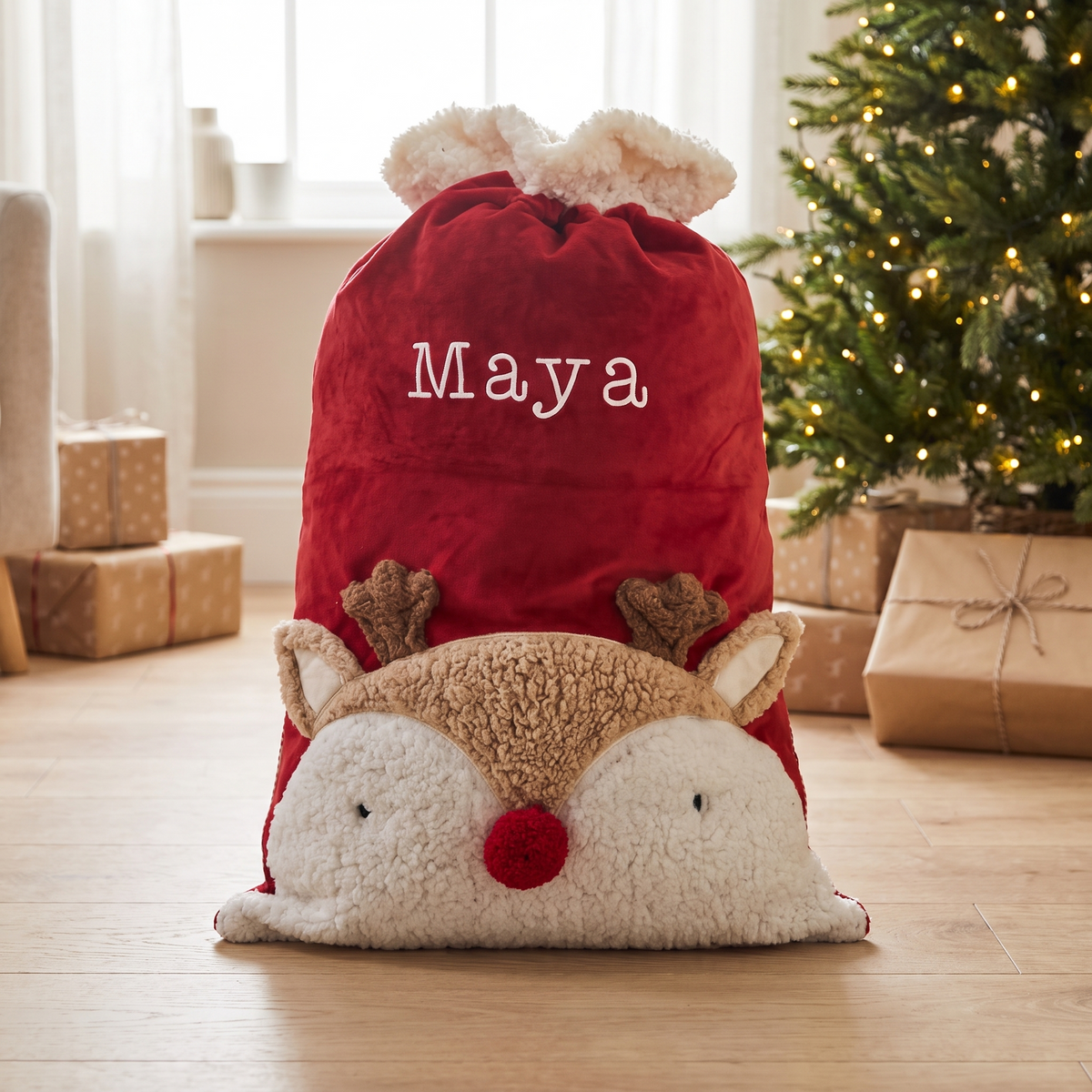 Personalised red reindeer Santa sack with fluffy antlers and pompom nose