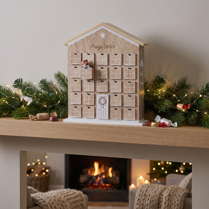 Close-up of numbered drawers on personalised gingerbread advent house
