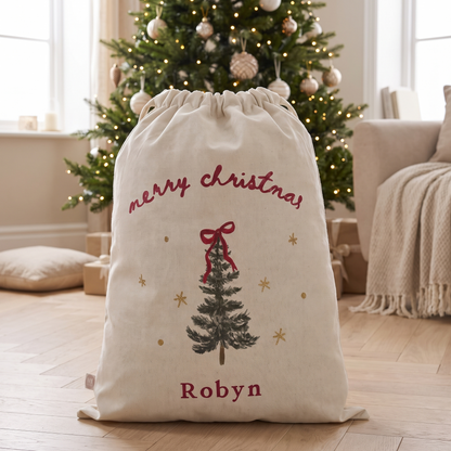 Personalised cream canvas Santa sack with Christmas tree, red bow and gold stars