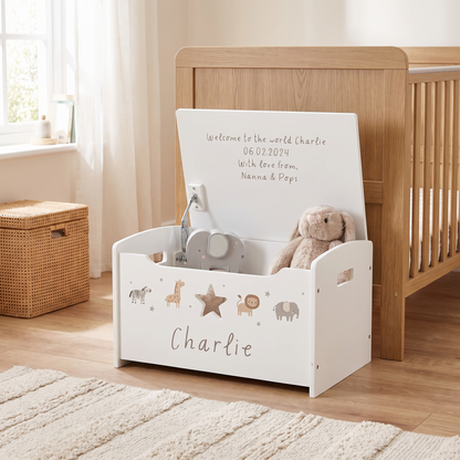 White safari toy box styled in a child's playroom with toys
