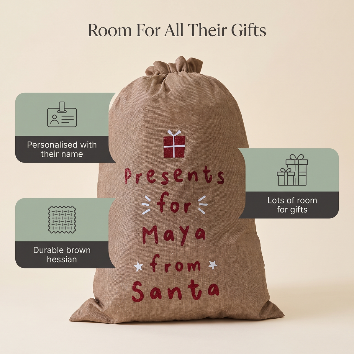 Child with a personalised hessian Santa sack on Christmas morning