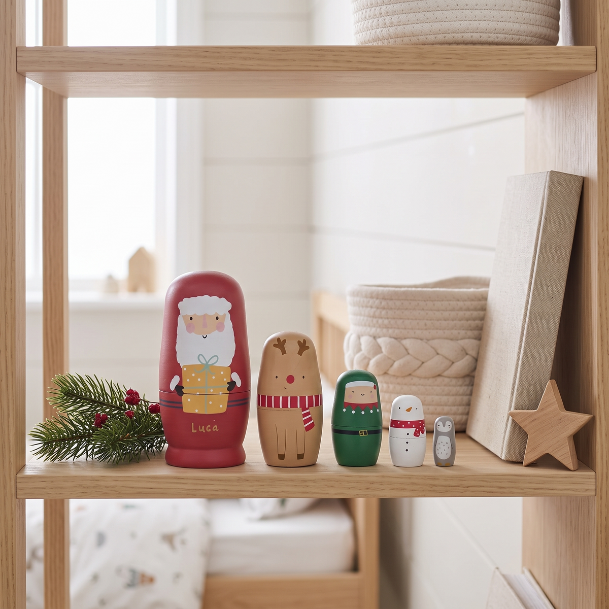 Close-up of engraved name on wooden Santa nesting doll