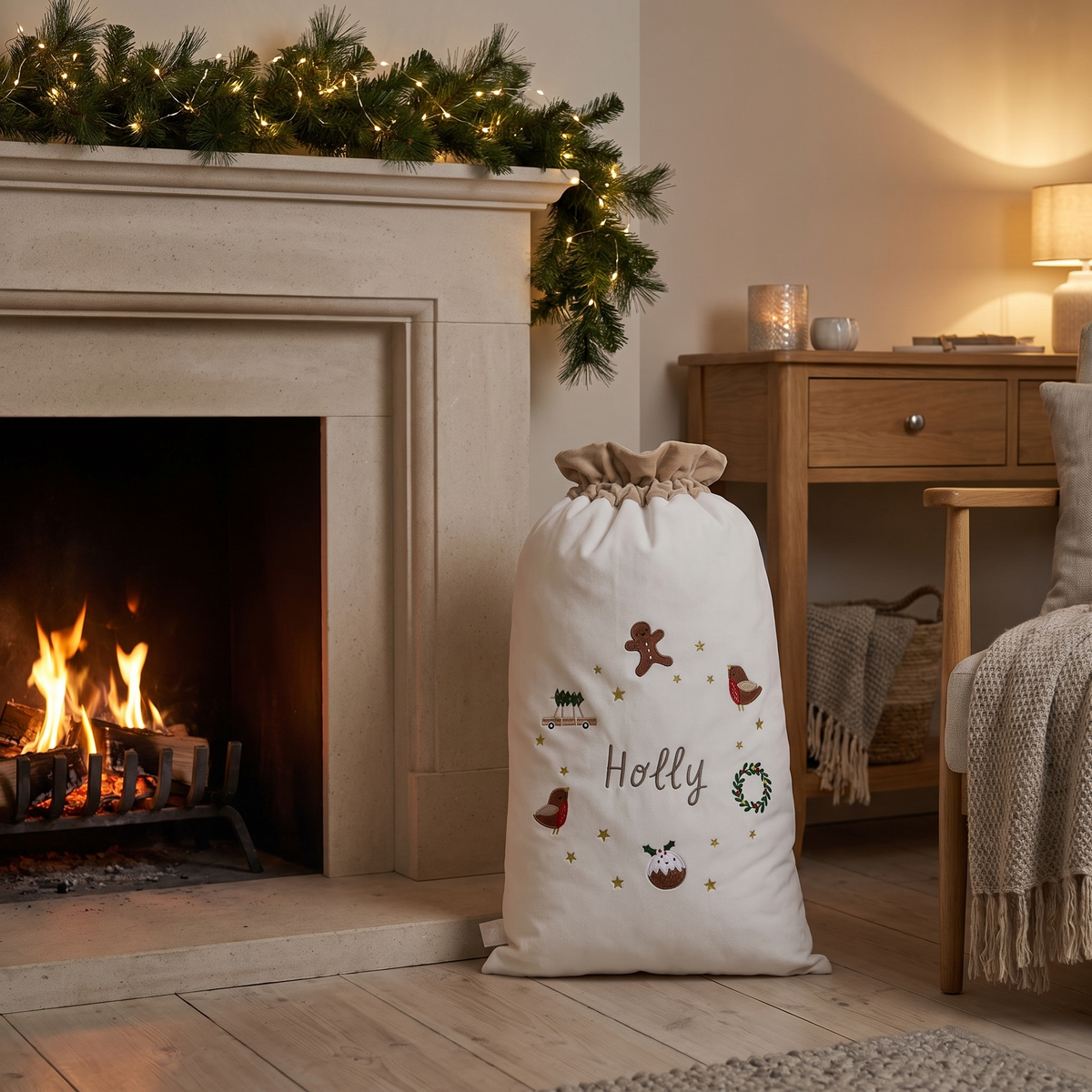 Close-up of name detail on plush cream personalised Santa sack