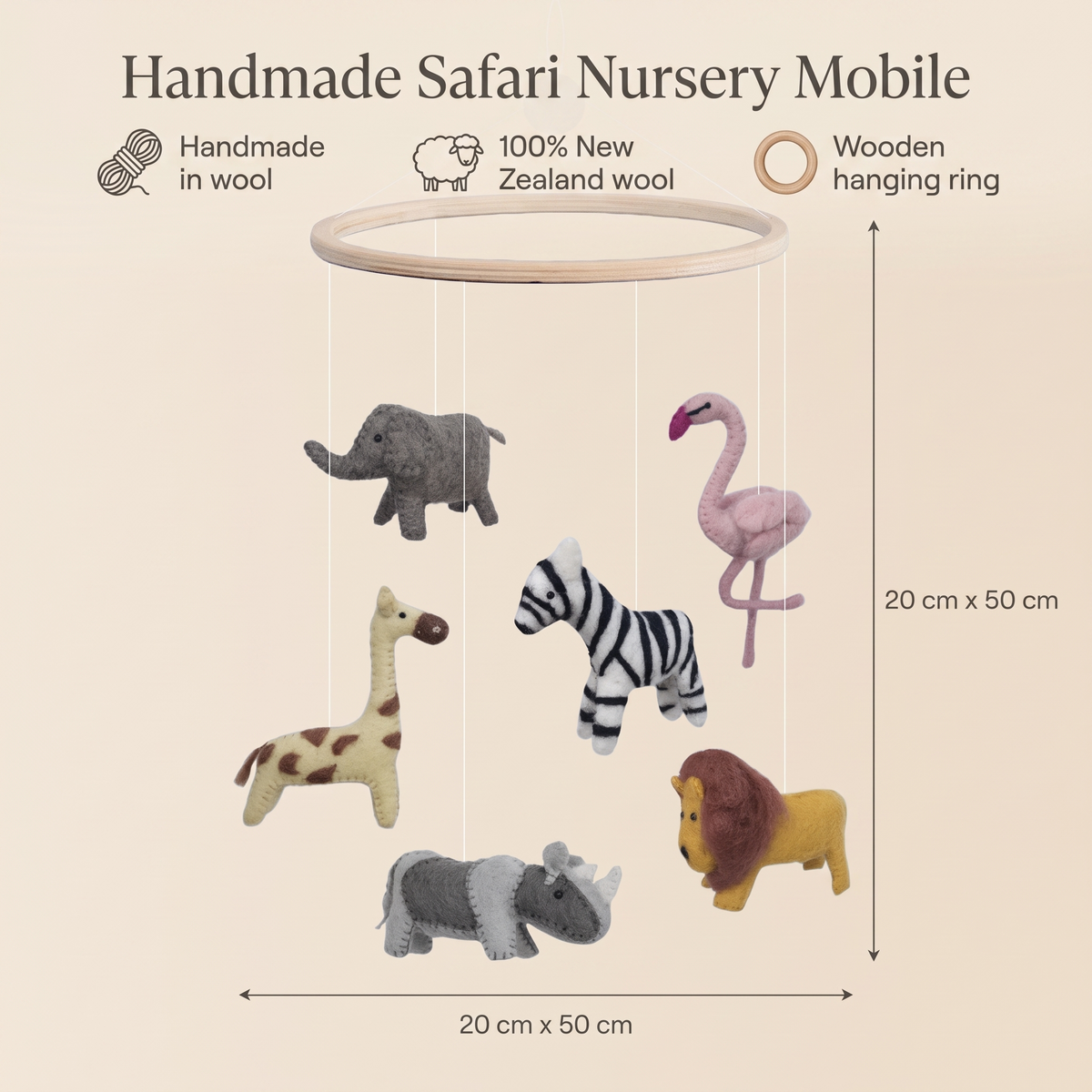Safari cot mobile styled above a nursery with soft neutral decor