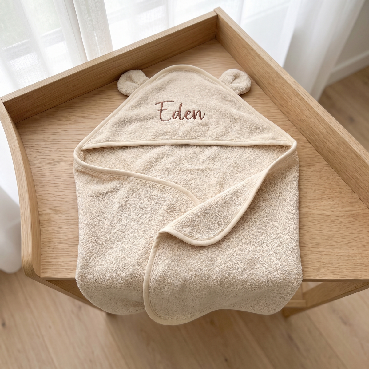 Personalised natural beige organic cotton hooded baby towel with embroidered name