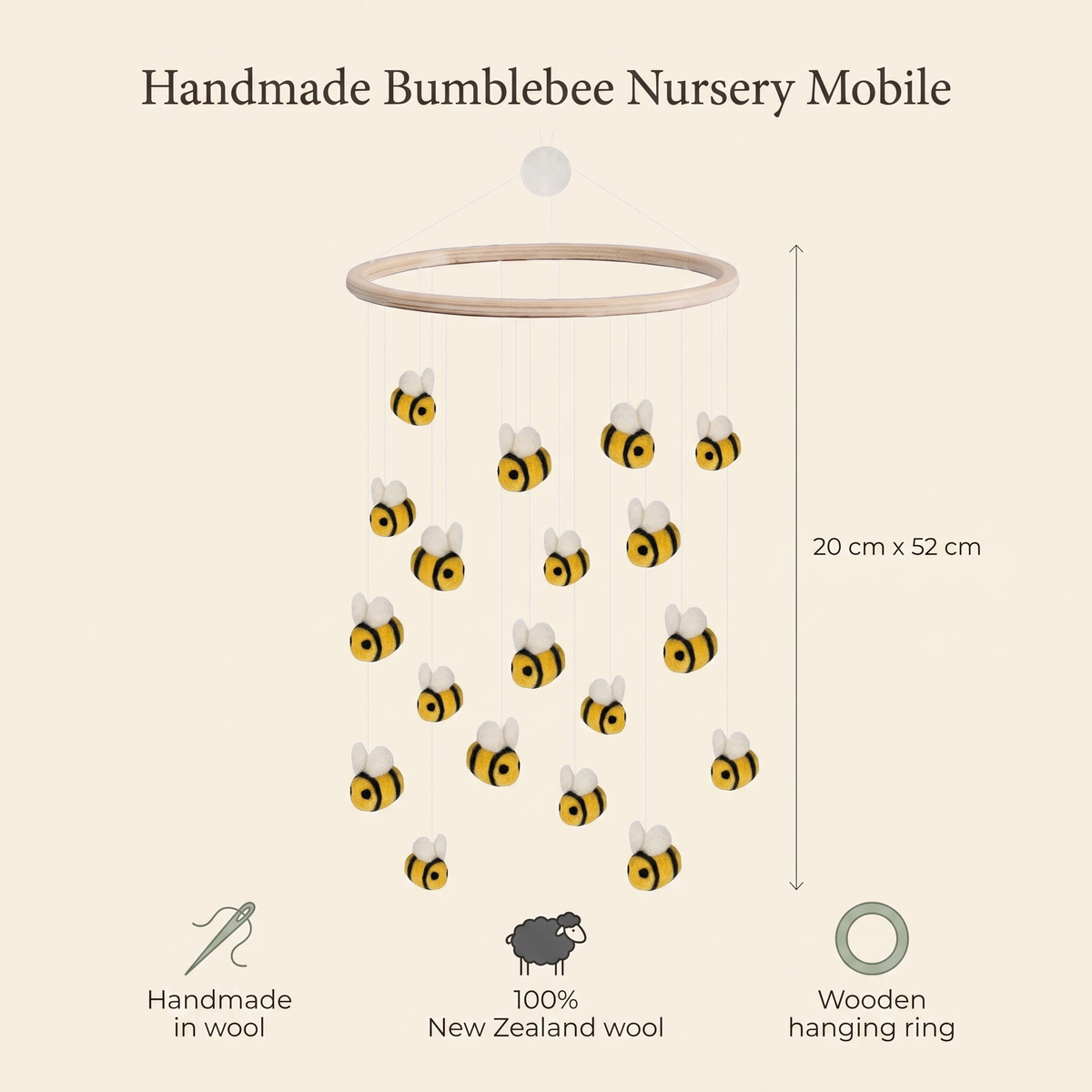 Bumblebee cot mobile styled above a nursery with yellow accents
