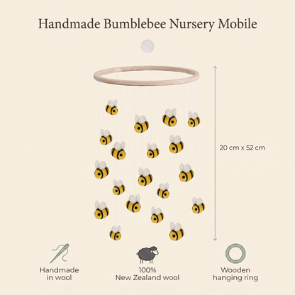 Bumblebee cot mobile styled above a nursery with yellow accents