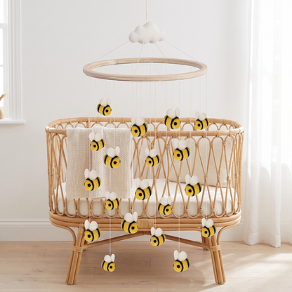 Bumblebee baby cot mobile with wool felt bees on a wooden frame