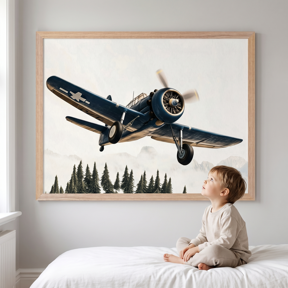 Framed vintage aircraft print hanging in a navy and white boys bedroom