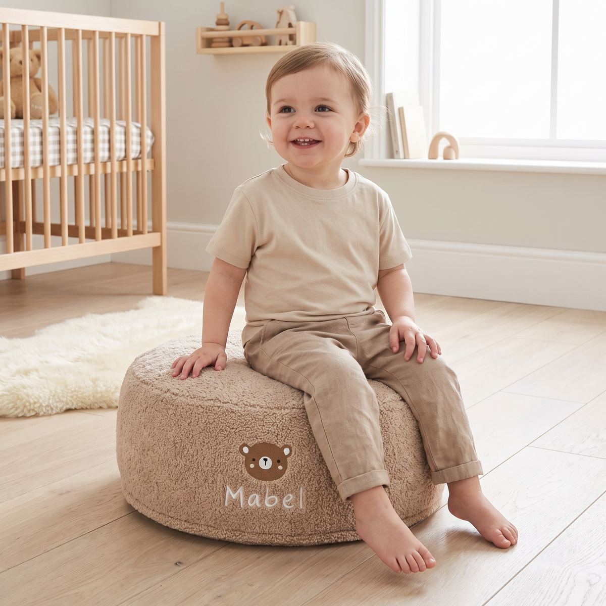 Close-up of the embroidered name on the soft borg caramel bear bean bag