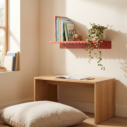 Close-up of the burnt red lacquered finish on the kids wall shelf