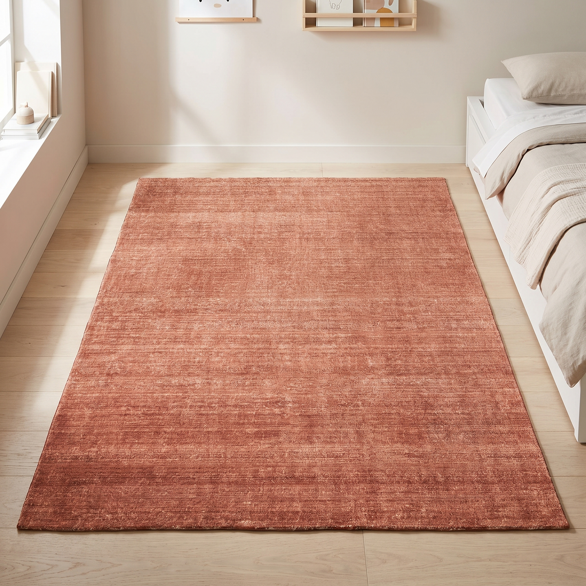 Little Teekie terracotta orange washable kids rug in a playroom