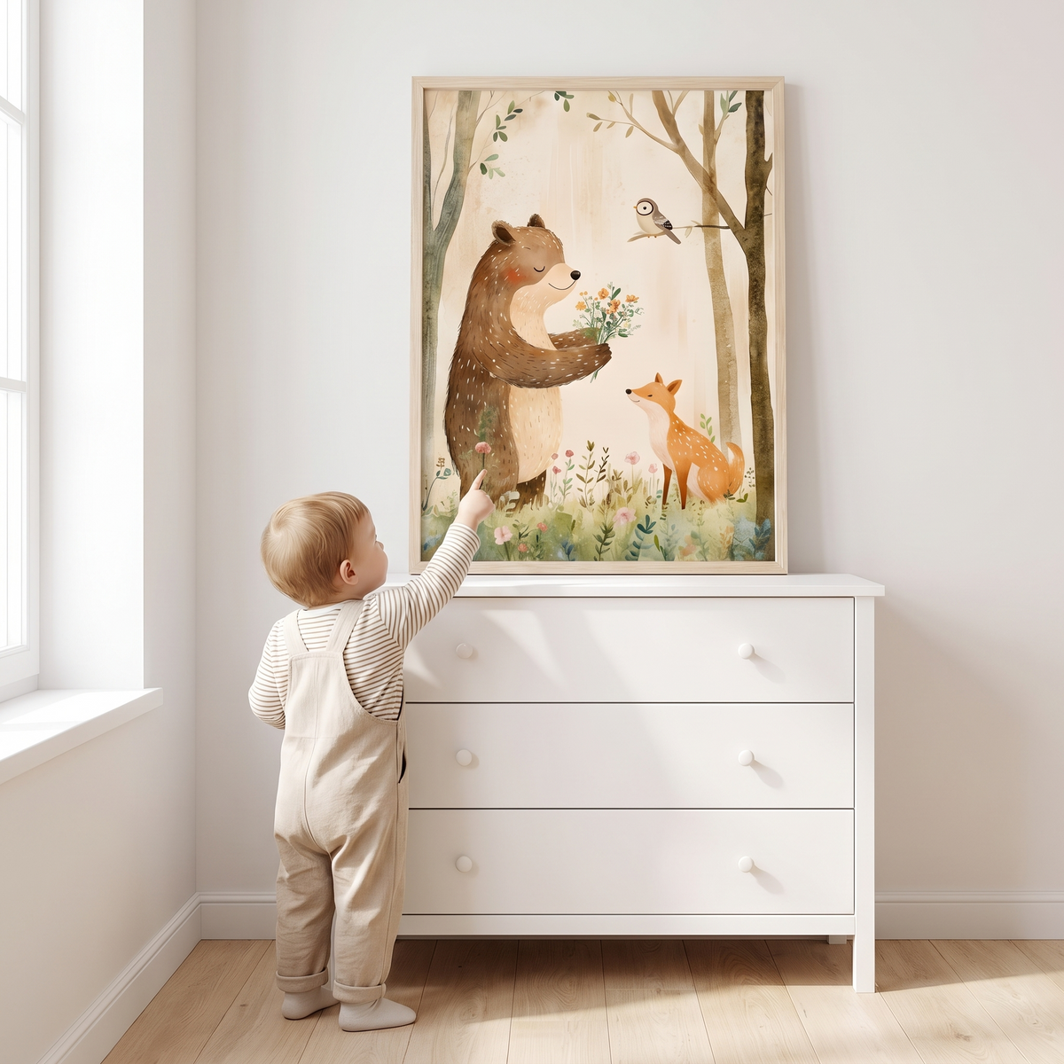 Framed bear and floral print hanging in a blush and sage nursery
