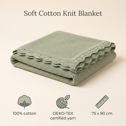 Sage green cotton knit baby blanket styled in a neutral nursery