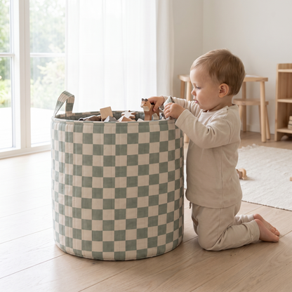 Checkerboard green storage basket styled in a bright nursery