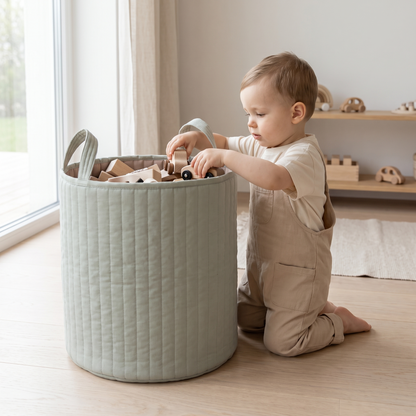 Sage storage basket styled in a calm neutral nursery
