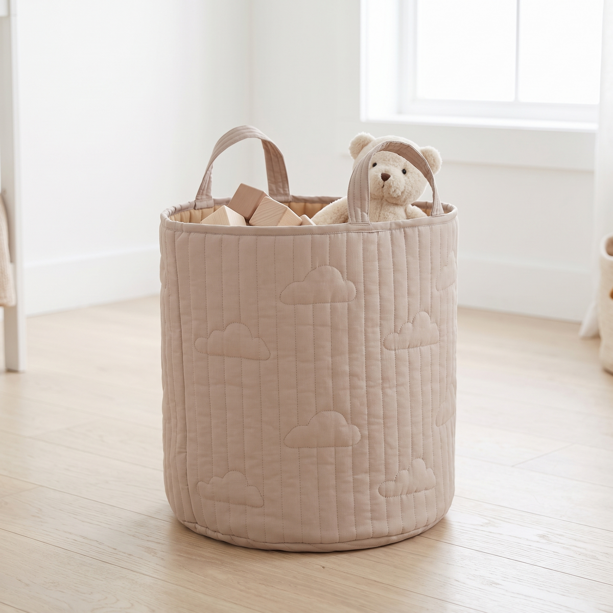 Cloud kids storage basket filled with soft toys in a nursery