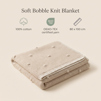 Natural cotton bobble knit baby blanket styled on a pram