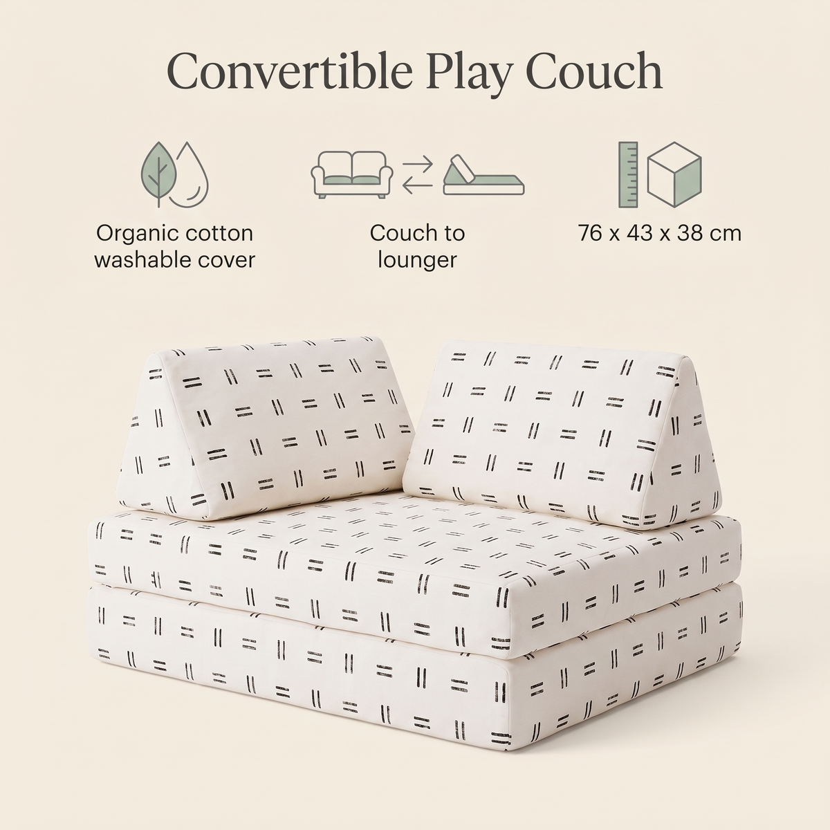 Modular mudcloth play couch pieces stacked into a fort in a living room