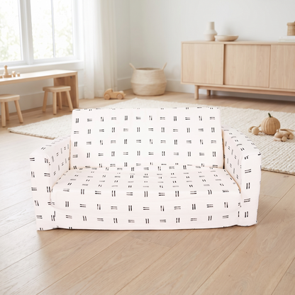 Mudcloth print kids play couch set up as a sofa in a bright playroom