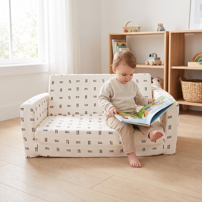 Close-up of the black and white mudcloth organic cotton cover on the play couch