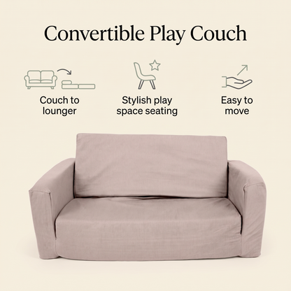 Modular Cloud play couch pieces stacked into a fort in a living room