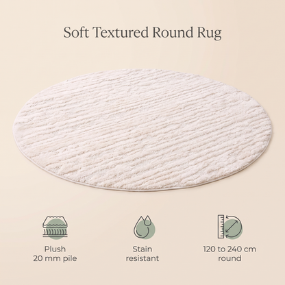 Ivory cream round rug in a bright child's bedroom