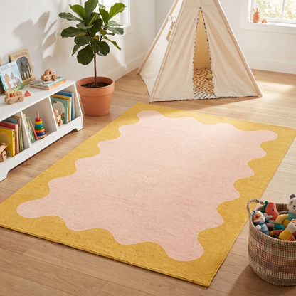 Close-up of wiggly border and plush pile on pink kids rug