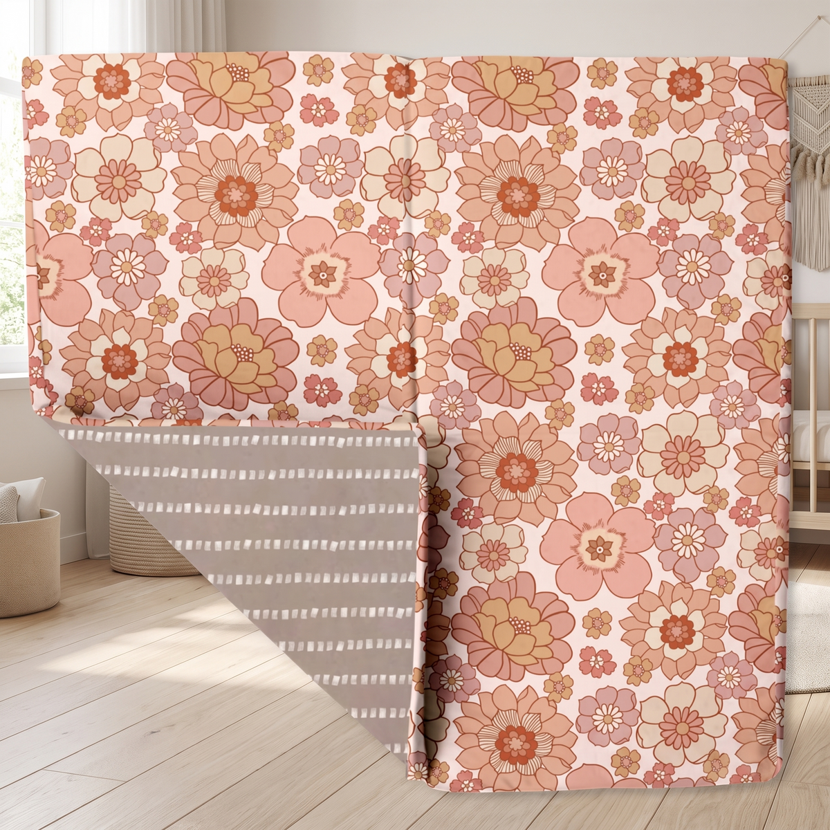 Blooms floral print organic cotton padded play mat on a living room floor