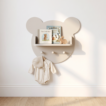Little Teekie pebble bear wall shelf mounted in a nursery with books and a night light