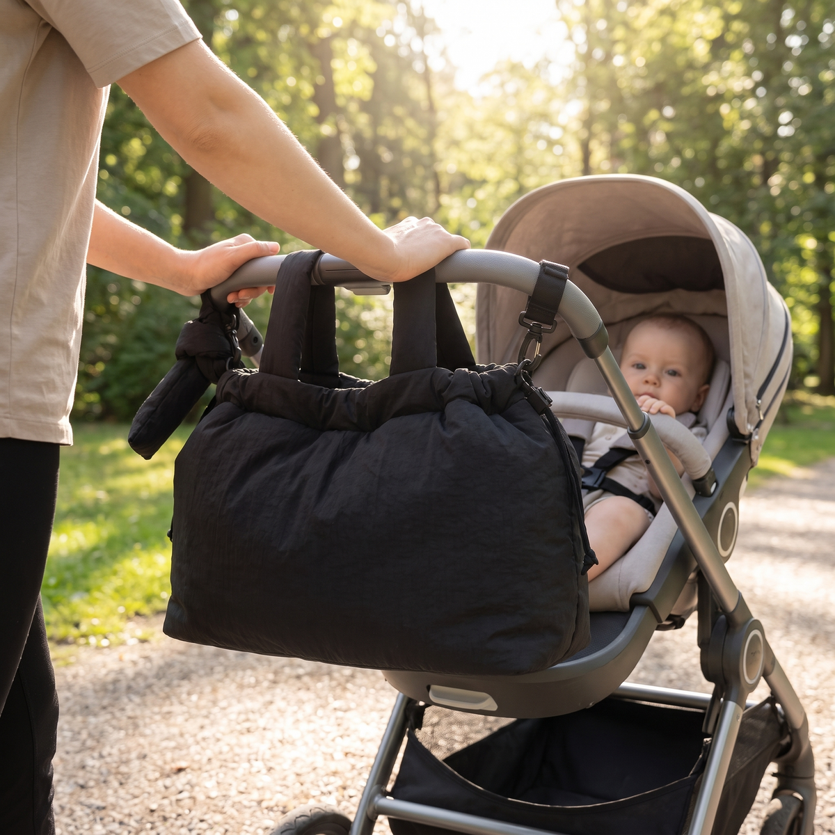 Little Teekie Recycled Nylon Pram Caddy | Lightweight Baby Bag – Black – in use, shows scale