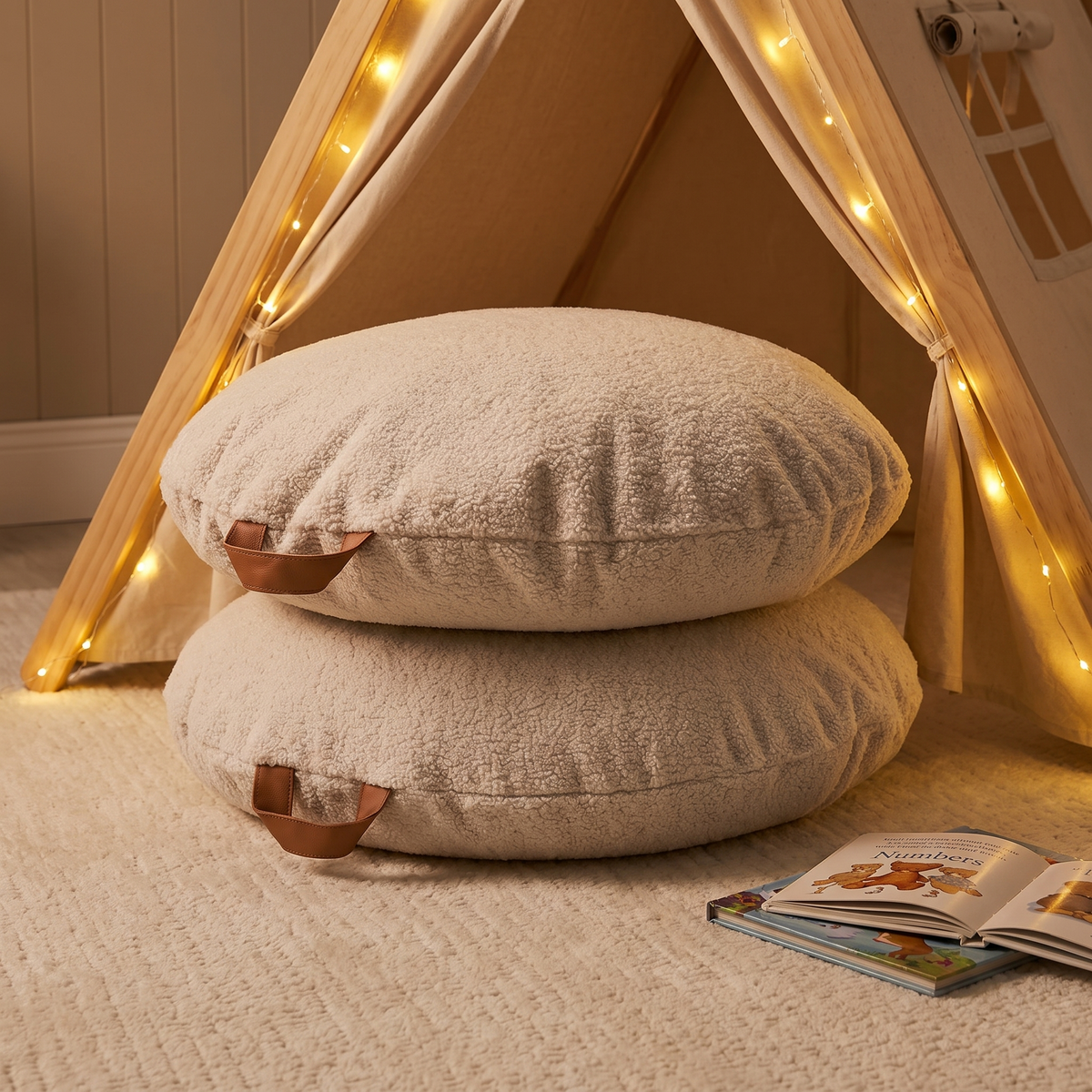 Little Teekie Tent Cushion Pair | Teddy Boucle Round Floor Cushions 70cm – Oat – styled in a reading nook