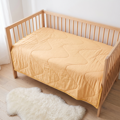 Little Teekie Quilted Bamboo Cotton Cot Bedspread | Plain Dyed, Cot Size – Butter Yellow – lifestyle hero