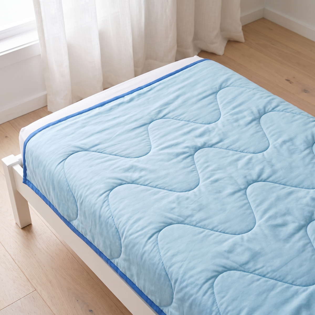 Little Teekie Quilted Bamboo Cotton Cot Bedspread | Cot Size – Sage – lifestyle hero