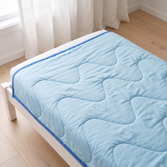Little Teekie Quilted Bamboo Cotton Cot Bedspread | Cot Size – Sage – lifestyle hero