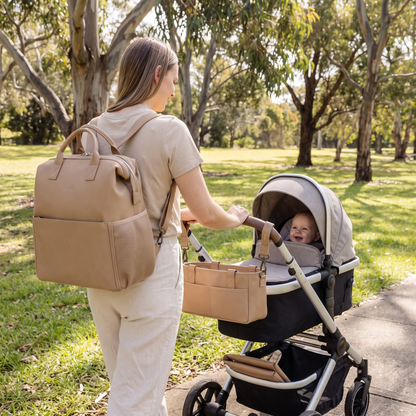 Little Teekie Ultimate Baby Bag Bundle | Nappy Backpack, Pram Caddy & 3-Piece Changing Set – Tan – in use, shows scale
