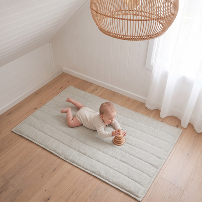 Little Teekie Linen Cot Quilt & Play Mat 2-in-1 | French Linen 100x120cm – Natural – in use, shows scale