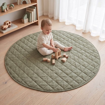 Little Teekie Quilted French Linen Round Play Mat | 115cm, Machine Washable – Olive – in use, shows scale