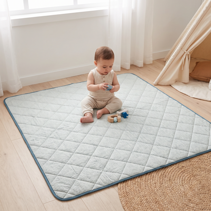 Little Teekie Quilted Cotton Cot Bedspread | Kids Quilt 100x120cm, Cotton Fill – Sage Stripe – in use, shows scale