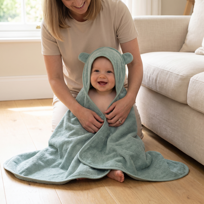 Little Teekie Personalised Hooded Towel | Embroidered Name, Organic Cotton 75 x 75cm – Sea Green – in use, shows scale